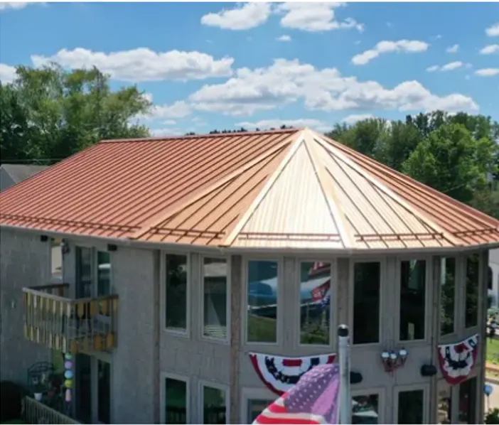 Tarping and dry-in on a Plymouth commercial roof